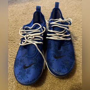 Nike Blue and White Athletic Shoes with Minimalist Design